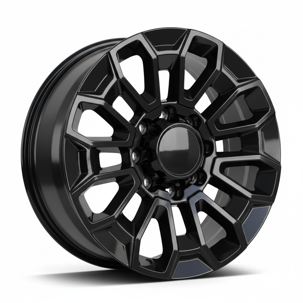 Black alloy wheel with a complex geometric spoke design and a central hubcap