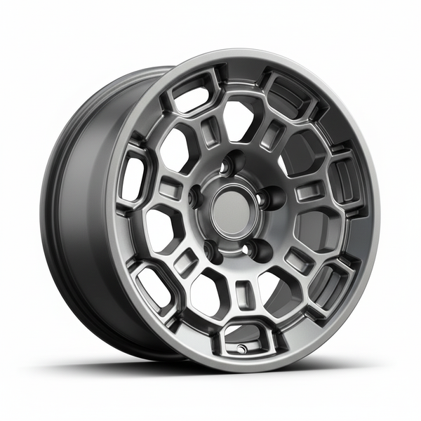 Silver car wheel with a honeycomb spoke pattern