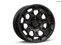 Black alloy wheel with a unique hexagonal spoke design