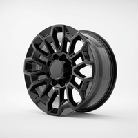Black alloy wheel with a geometric spoke design